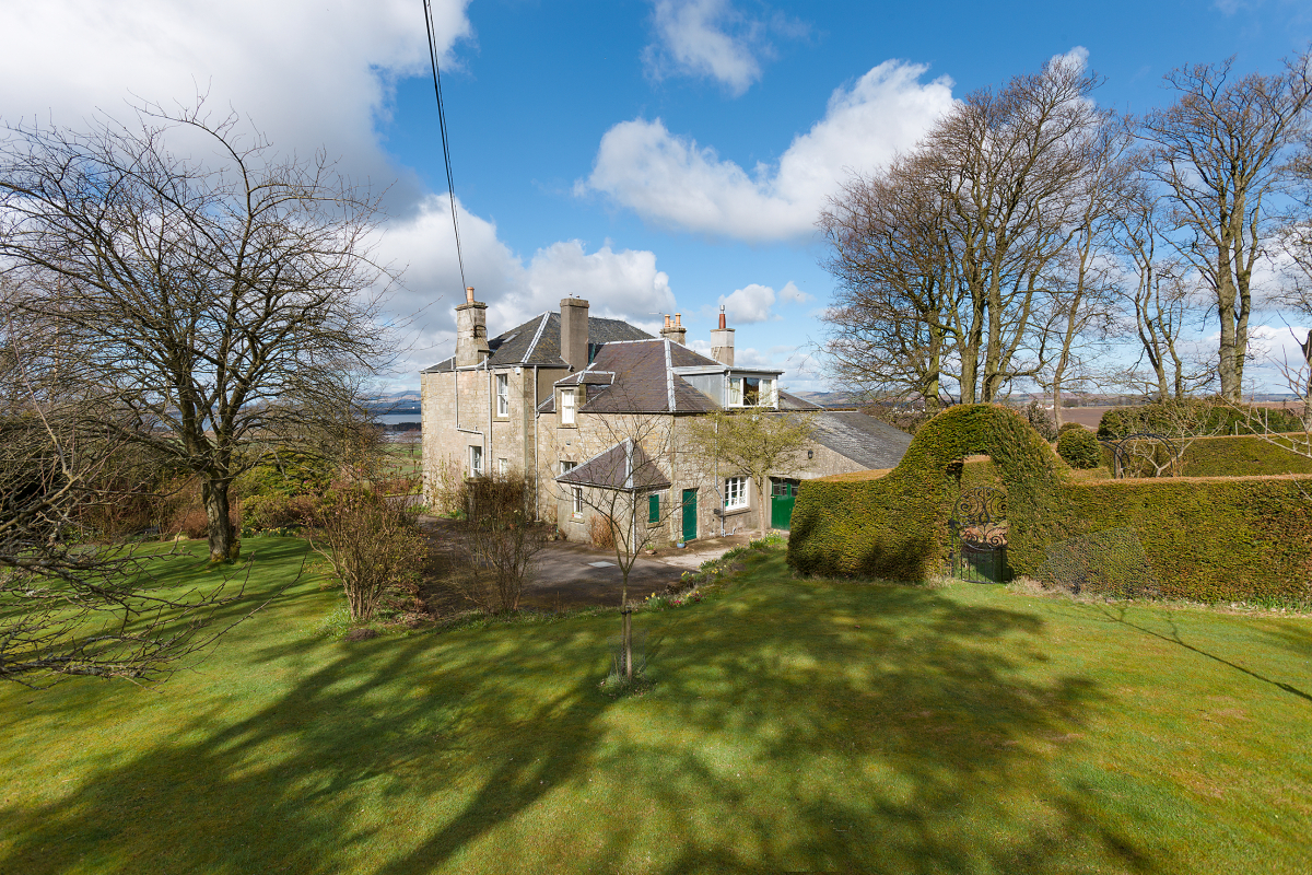 The back of the house and the back garden